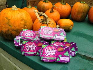 Christmas Means Quality Street – A Green Triangle Pudding