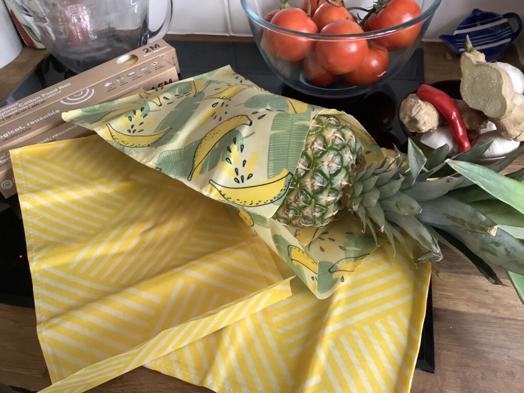 pineapple being stored in a medium size bees wrap bag