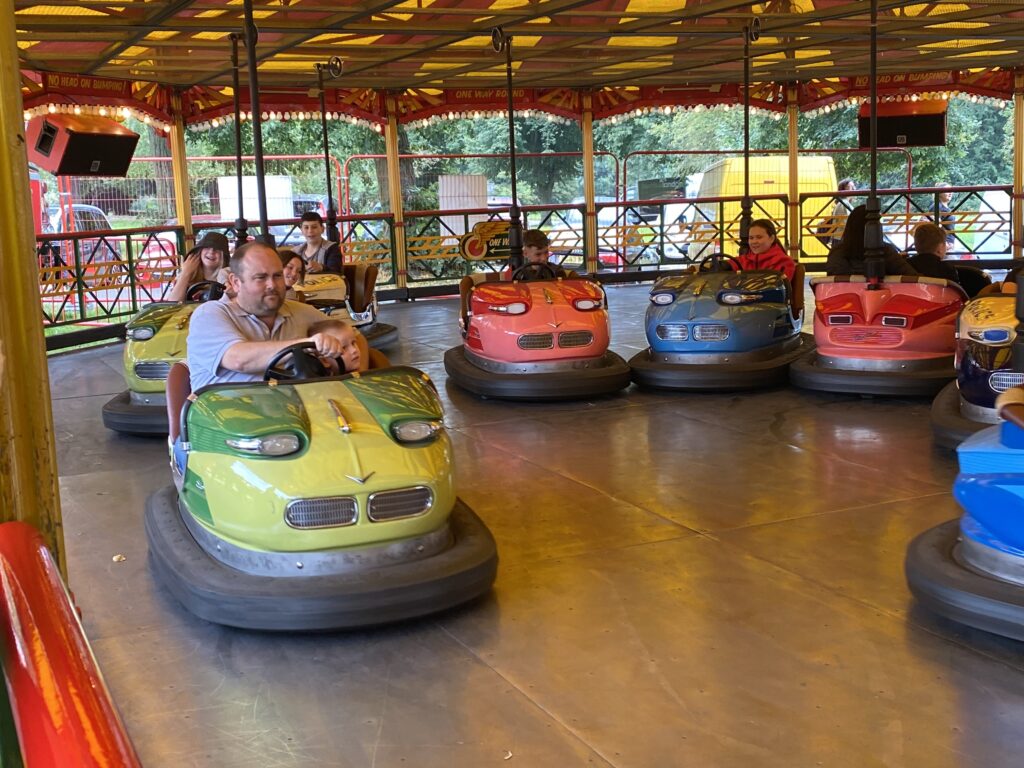Father and son on the dodgems