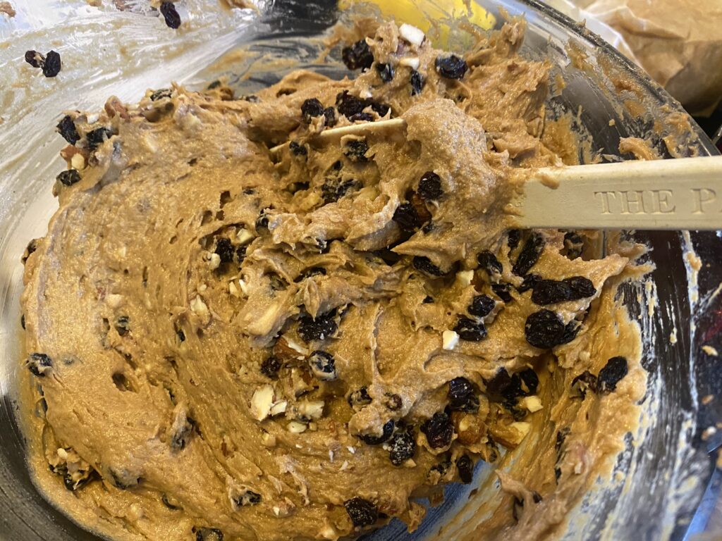Large bowl showing the cake mixture before adding the glacé fruits