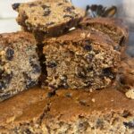 Close up of squares of Depression Cake showing the lovely dried fruits