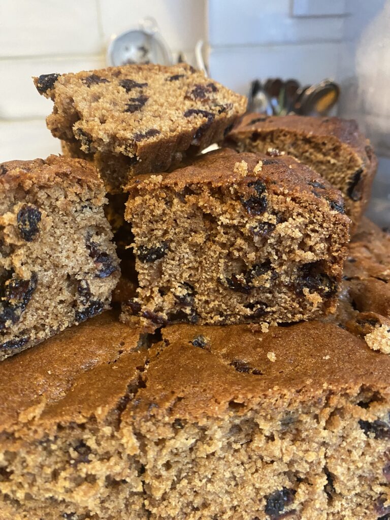 Close up of squares of Depression Cake showing the lovely dried fruits