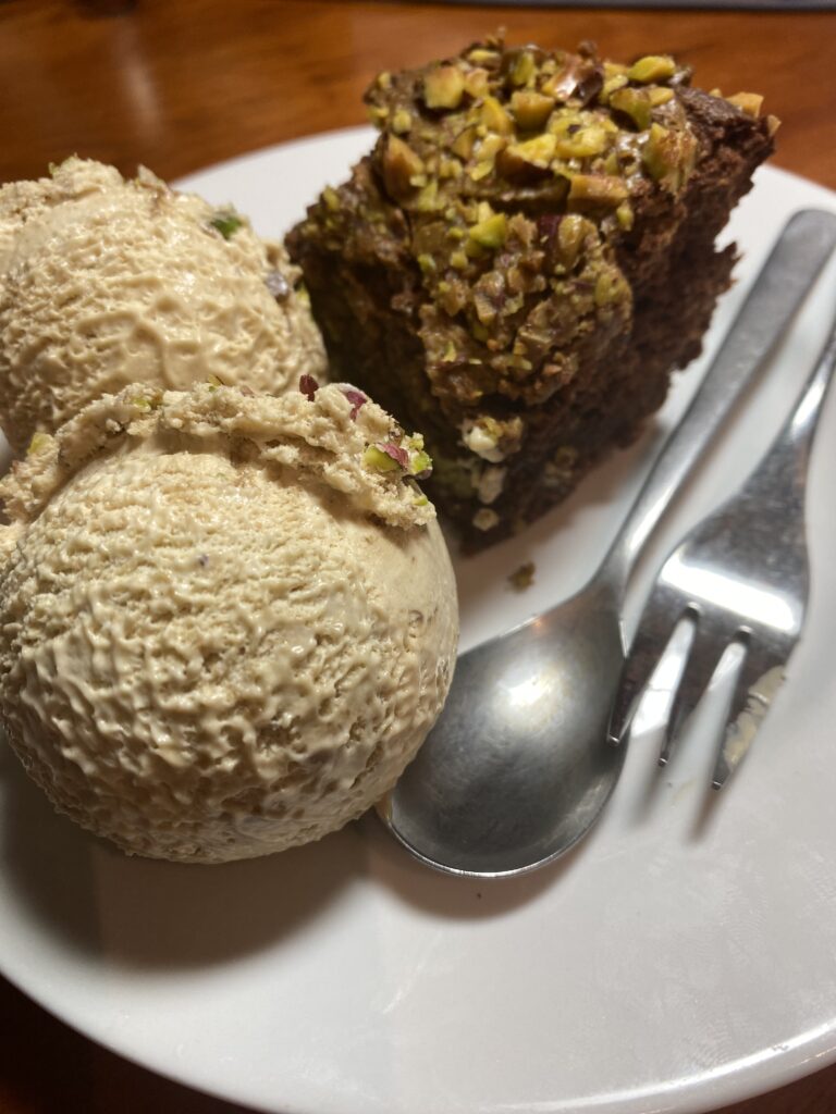Two scoops of ice cream, chocolate brownie